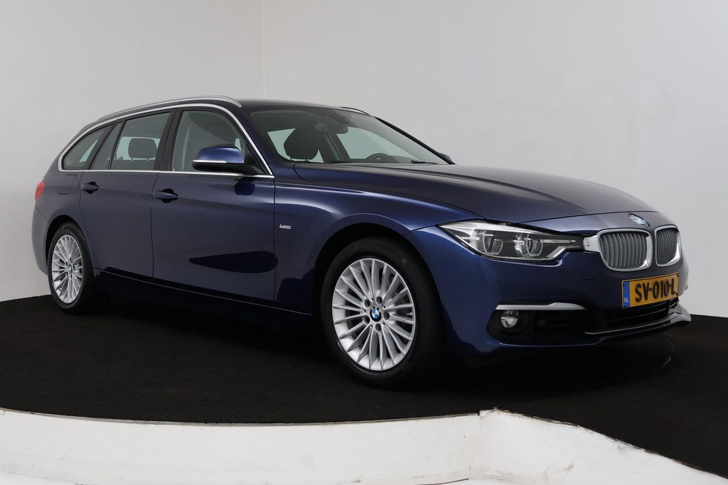 
BMW 3 Serie Touring 318i Luxury Edition (CRUISE CONTROL, NAVIGATIE, PARKEERSENSOREN, STOELVERWARMING, NL-AUTO) vol									