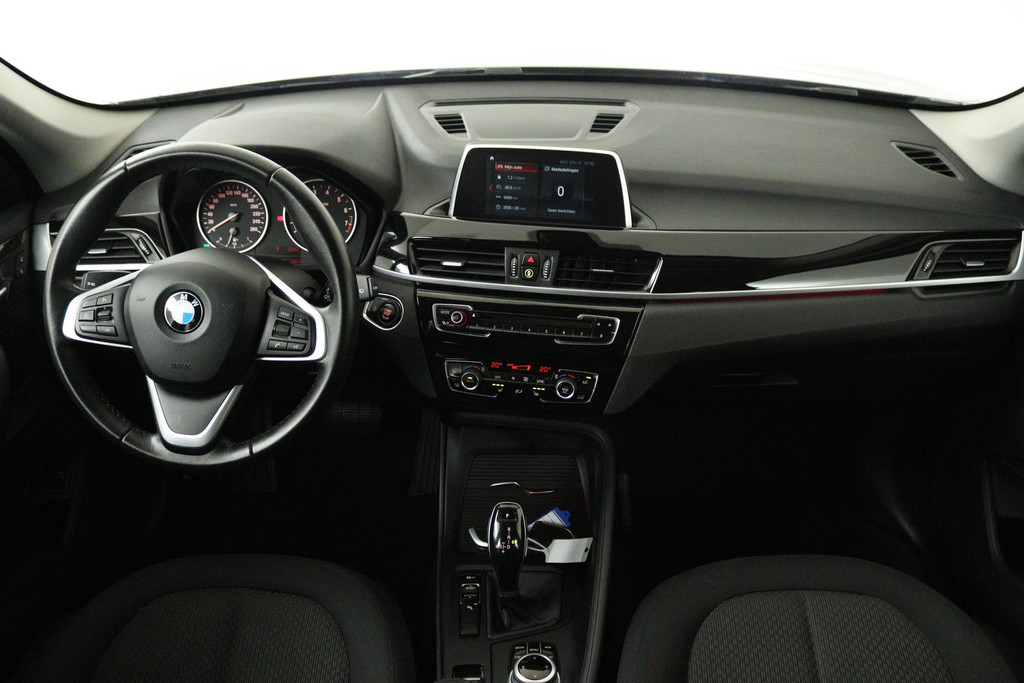 
BMW X1 SDrive18i High Executive (PARKEERSENSOREN, CRUISE, NAVI, STOELVERWARMING, AUTOMAAT, NL-AUTO, DEALER ONDERHOUDEN) vol									
