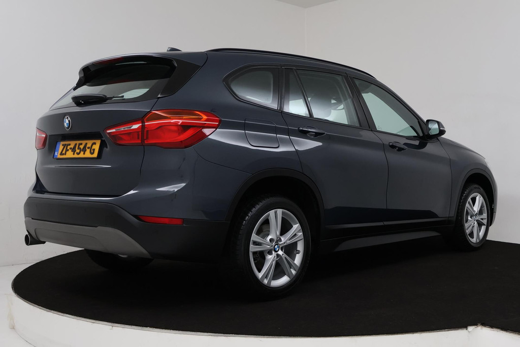 
BMW X1 SDrive18i High Executive (PARKEERSENSOREN, CRUISE, NAVI, STOELVERWARMING, AUTOMAAT, NL-AUTO, DEALER ONDERHOUDEN) vol									