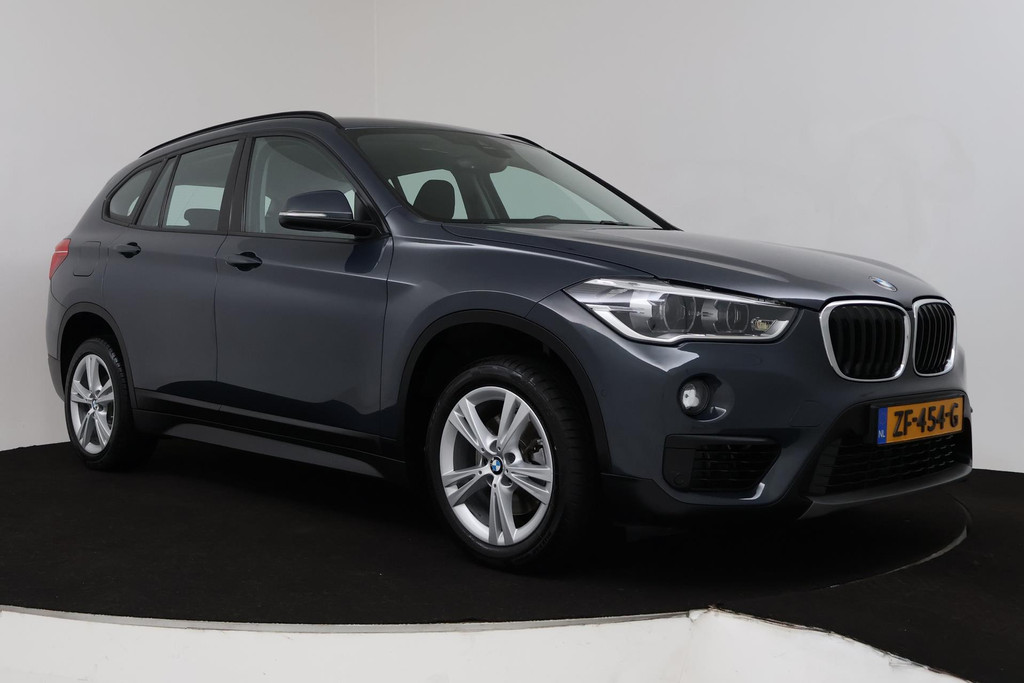 
BMW X1 SDrive18i High Executive (PARKEERSENSOREN, CRUISE, NAVI, STOELVERWARMING, AUTOMAAT, NL-AUTO, DEALER ONDERHOUDEN) vol									