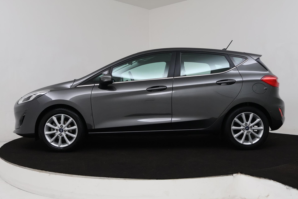 
Ford Fiesta 1.0 EcoBoost Titanium (NAVI, CAMERA, STOELVERWARMING, PARKEERSENSOREN, AUTO INPARKEREN, GOED ONDERHOUDEN) vol									