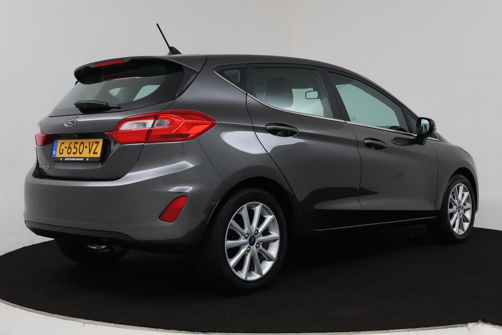 
Ford Fiesta 1.0 EcoBoost Titanium (NAVI, CAMERA, STOELVERWARMING, PARKEERSENSOREN, AUTO INPARKEREN, GOED ONDERHOUDEN) vol									