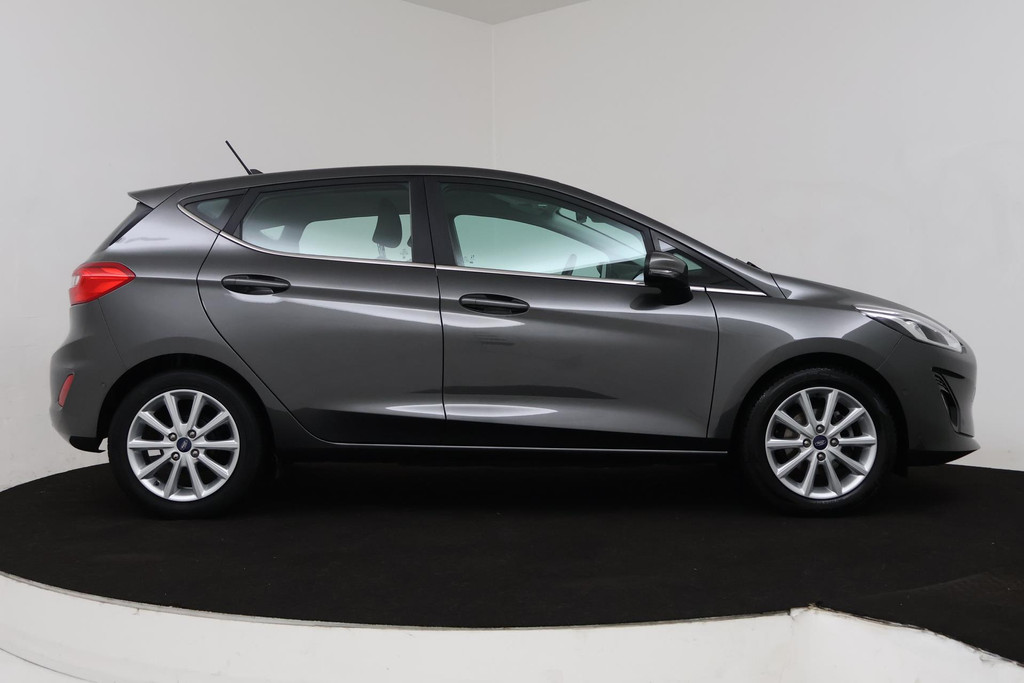 
Ford Fiesta 1.0 EcoBoost Titanium (NAVI, CAMERA, STOELVERWARMING, PARKEERSENSOREN, AUTO INPARKEREN, GOED ONDERHOUDEN) vol									