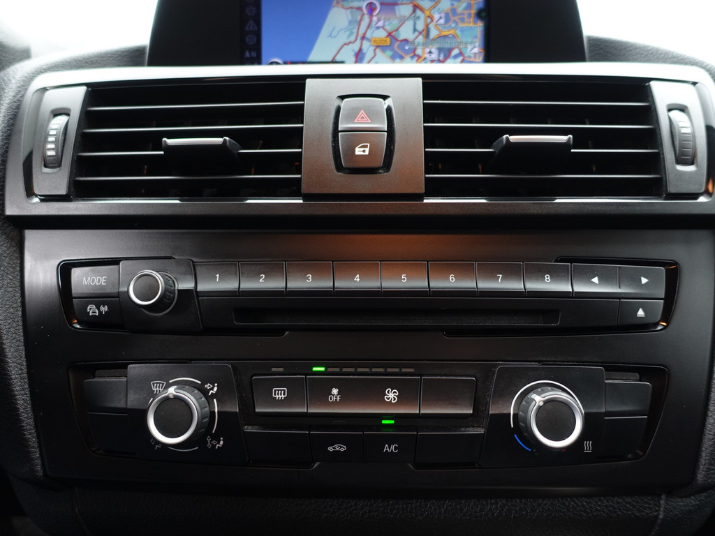 
BMW 1-serie 114i EDE High Executive Blackpack, Navi, Clima, Cruise, Dynamic Select vol									