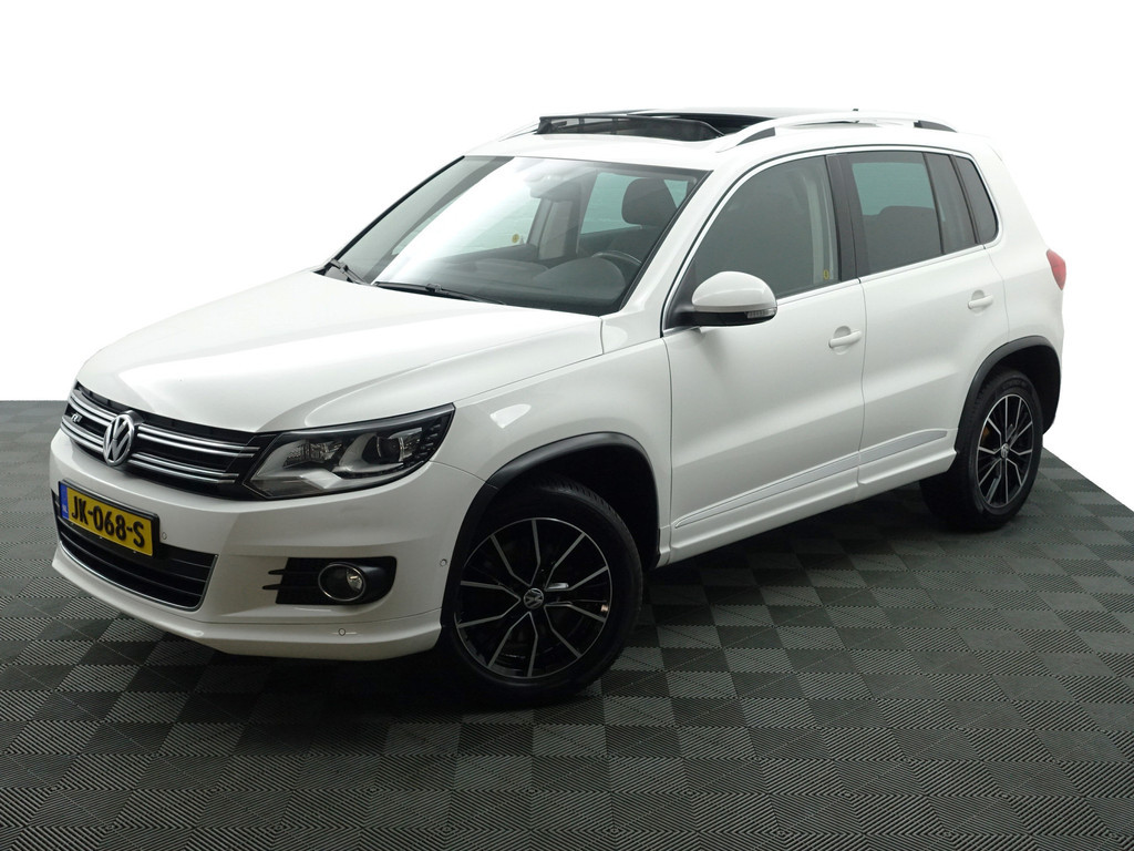 
								Volkswagen Tiguan 2.0 TSI 180pk 4motion R Line Aut- Panodak, Xenon Led, Bearlock, Dynaudio, Park Assist, Park Pilot, Camera vol									