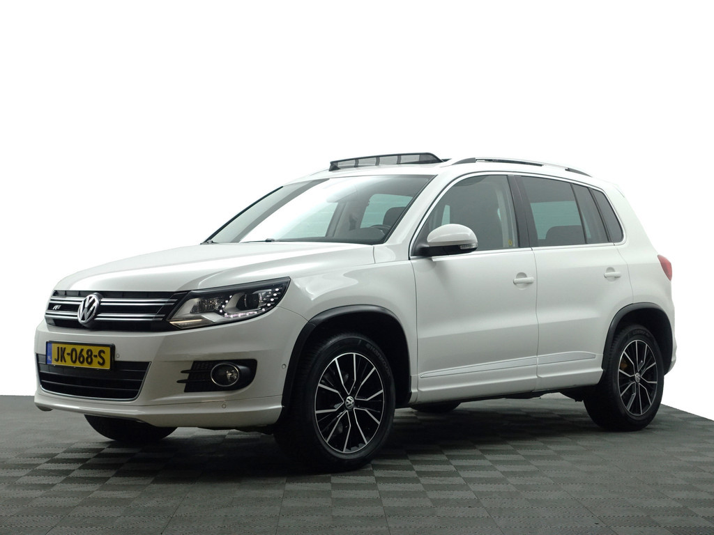 
								Volkswagen Tiguan 2.0 TSI 180pk 4motion R Line Aut- Panodak, Xenon Led, Bearlock, Dynaudio, Park Assist, Park Pilot, Camera vol									