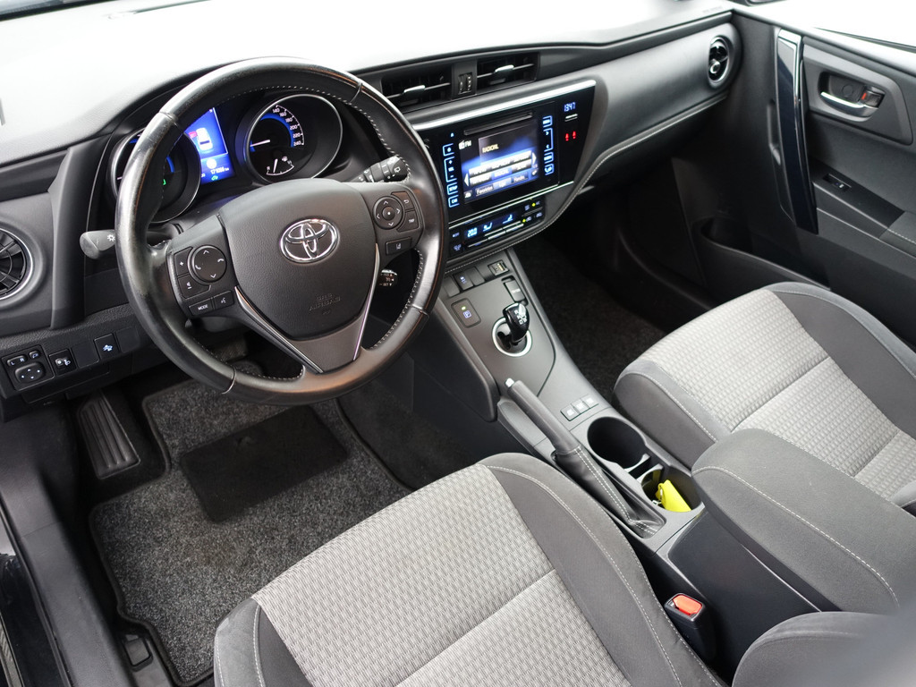 
Toyota Auris Touring Sports 1.8 Hybrid Dynamic Aut- Comfort Interieur, Camera, Navi, Cruise, Clima, Lane Assist vol									