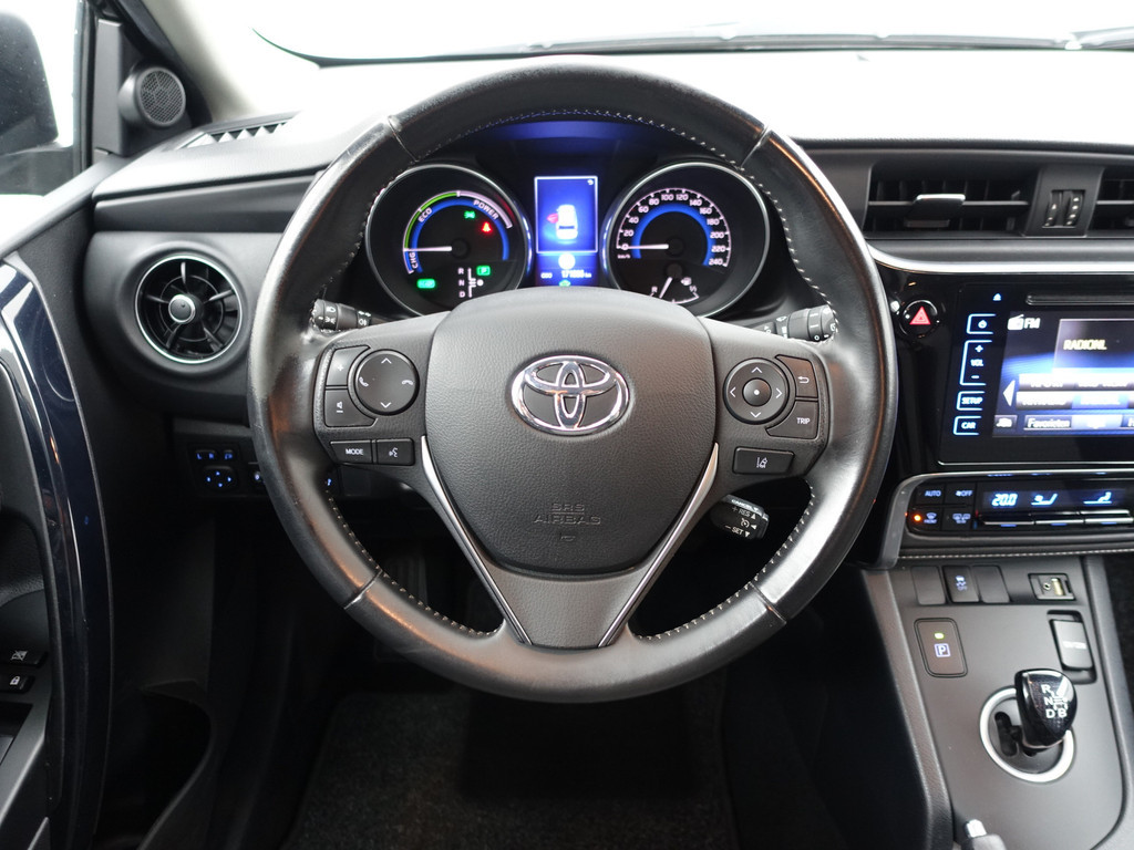 
Toyota Auris Touring Sports 1.8 Hybrid Dynamic Aut- Comfort Interieur, Camera, Navi, Cruise, Clima, Lane Assist vol									