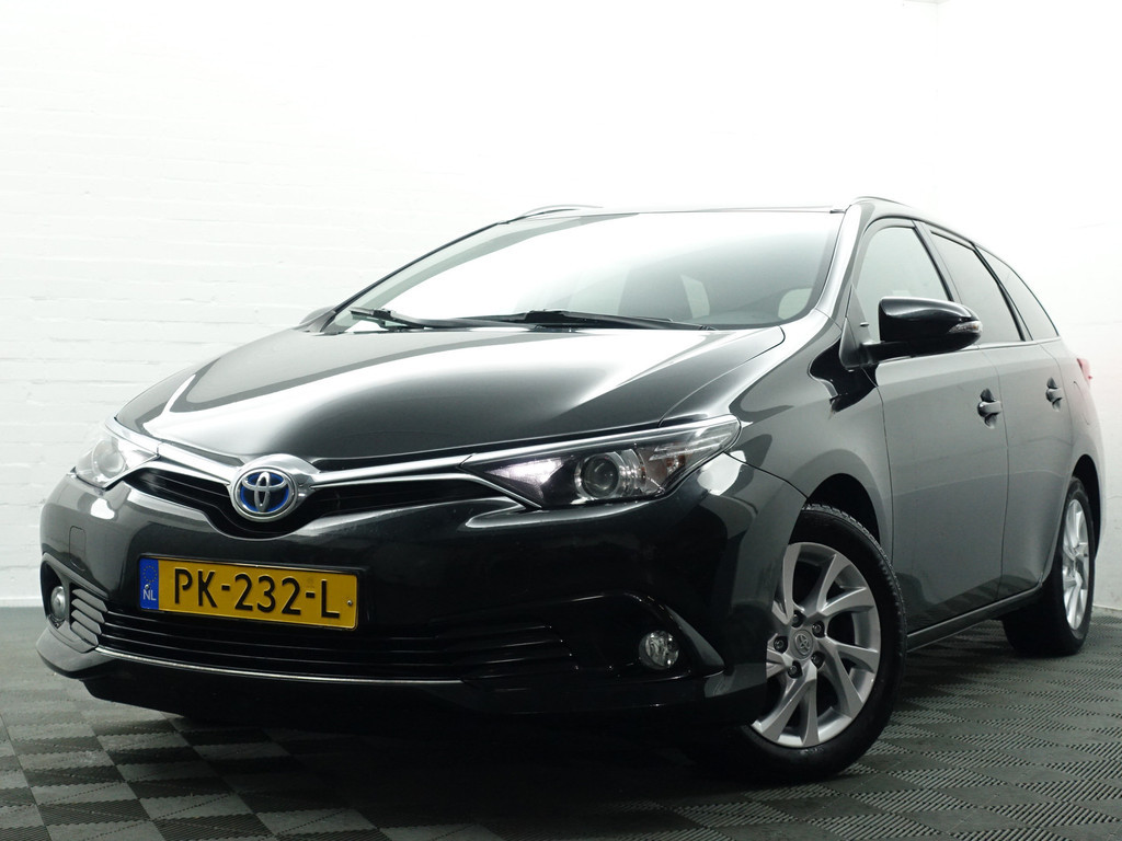 
Toyota Auris Touring Sports 1.8 Hybrid Dynamic Aut- Comfort Interieur, Camera, Navi, Cruise, Clima, Lane Assist vol									