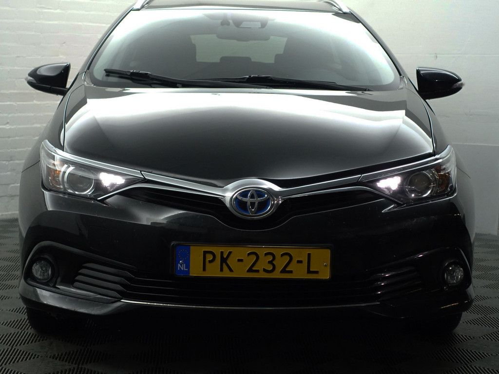 
Toyota Auris Touring Sports 1.8 Hybrid Dynamic Aut- Comfort Interieur, Camera, Navi, Cruise, Clima, Lane Assist vol									