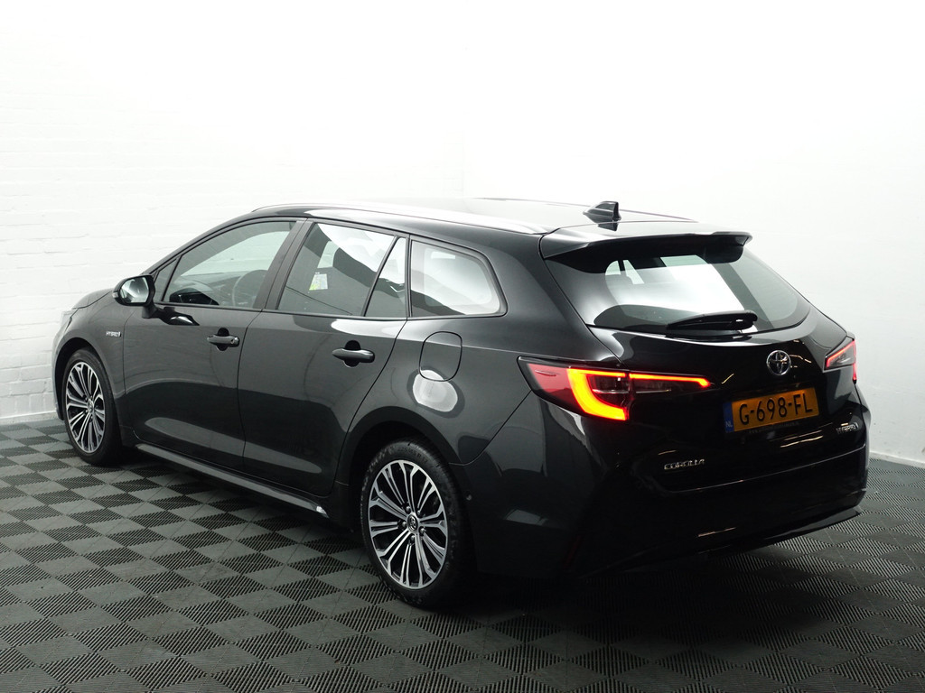 
Toyota Corolla Touring Sports 1.8 Hybrid Business Intro Head Up, Camera, Navi, Stoellverwarming, Clima, Comfort Interieur vol									