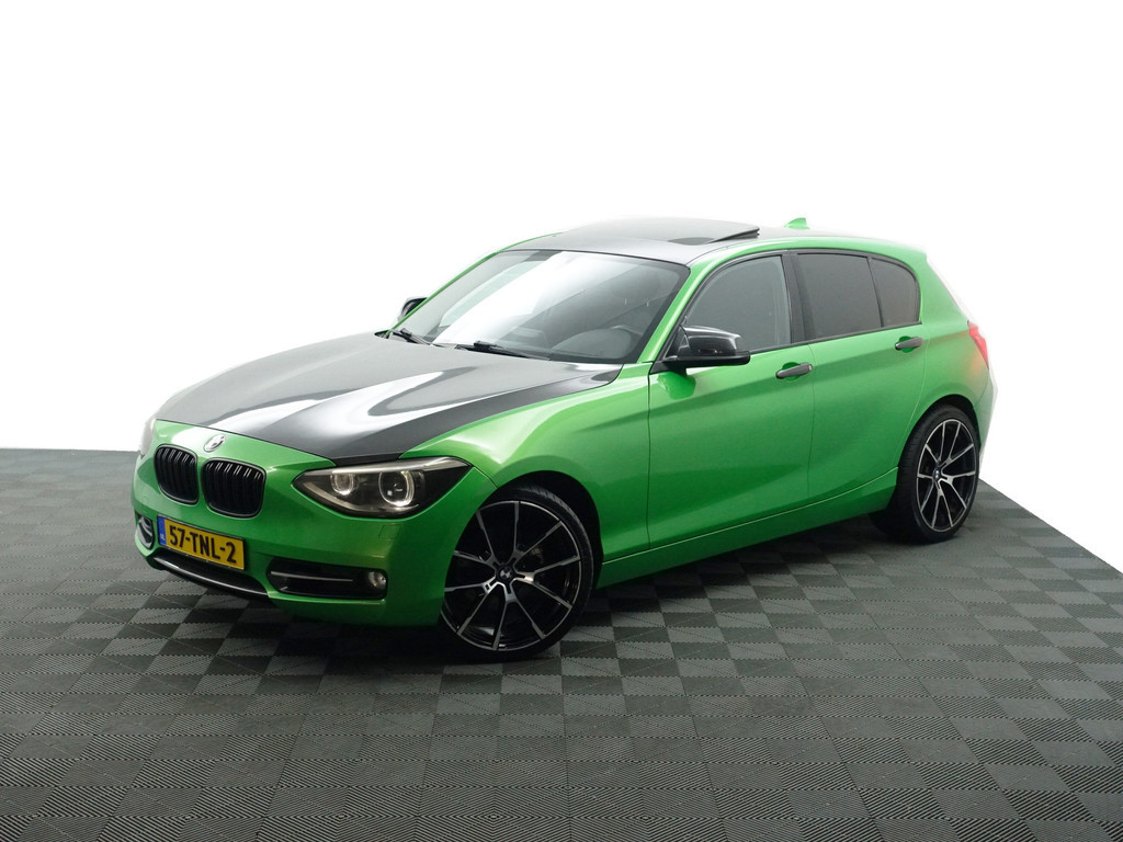
BMW 1-serie 118i M Sport- Schuifdak, Xenon Led, Leder Sport Interieur, Carbon Pakket, Park Assist vol									