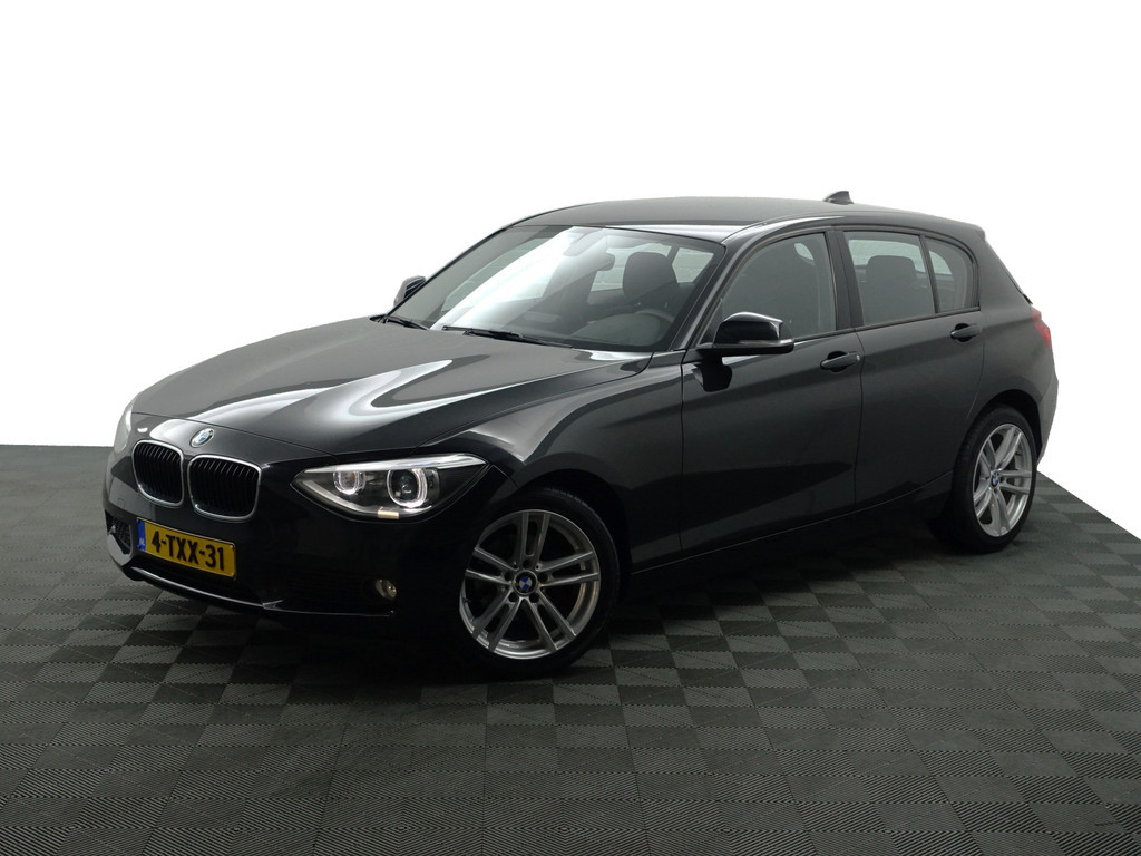 
								BMW 1-serie 116i High Executive Aut- Xenon Led, Park Assist, Dynamic Select, Navi, Clima, Cruise vol									