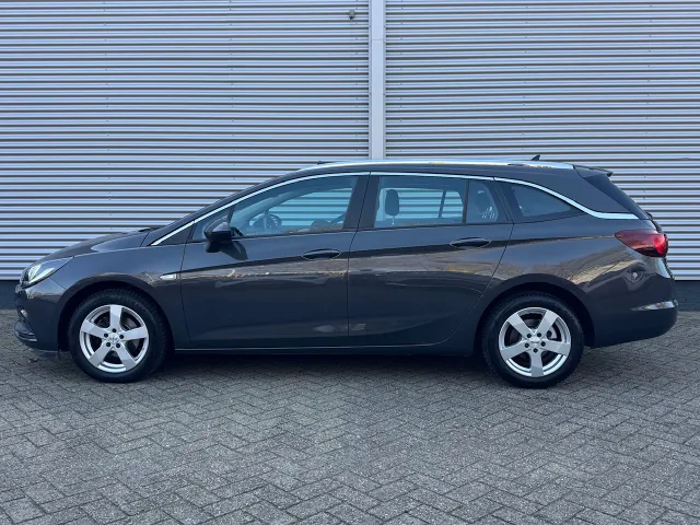 
Opel Astra 1.4 Turbo 150pk Business+ | Schuif/Kanteldak | Trekhaak | Navigatie | vol									