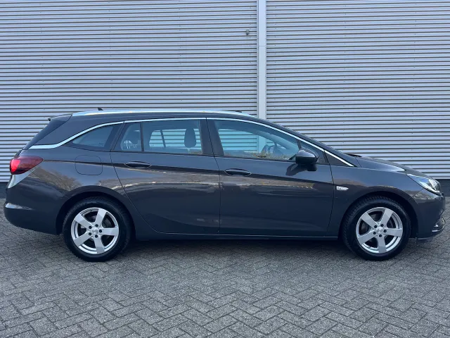 
Opel Astra 1.4 Turbo 150pk Business+ | Schuif/Kanteldak | Trekhaak | Navigatie | vol									