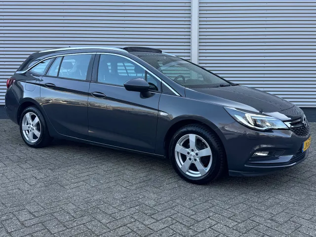 
Opel Astra 1.4 Turbo 150pk Business+ | Schuif/Kanteldak | Trekhaak | Navigatie | vol									